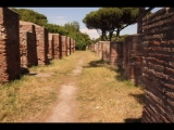 00665 ostia - regio ii - decumanus maximus - regio ii - insula ii - portico del tetto spiovente (ii,ii,6) - ri westen - 06-2022.jpg